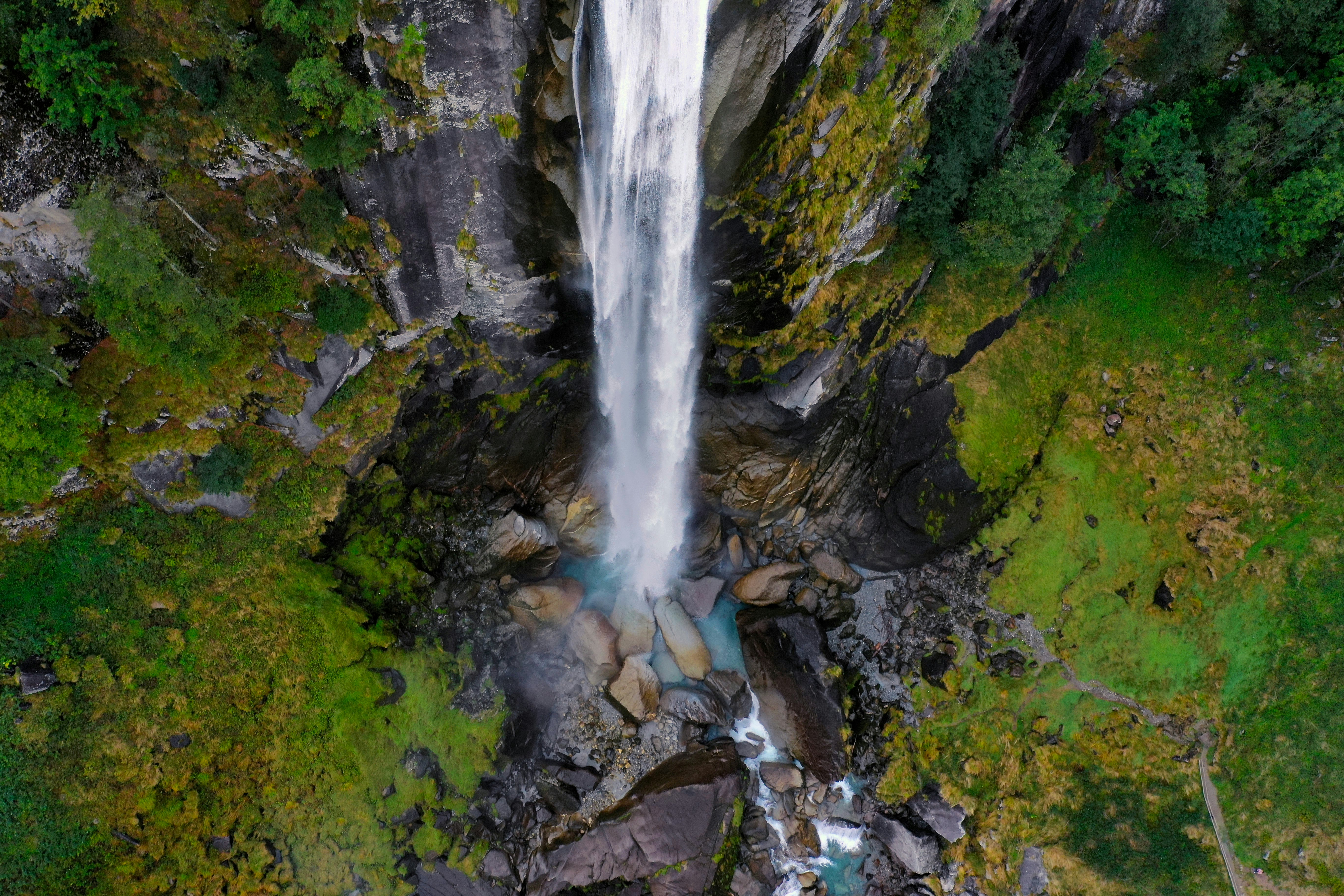 water falls on rocky ground